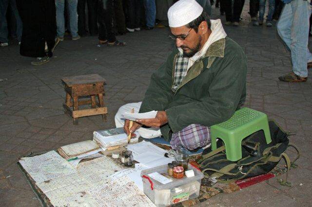 Marokkanischlehrer auf dem Djemaa el Fna